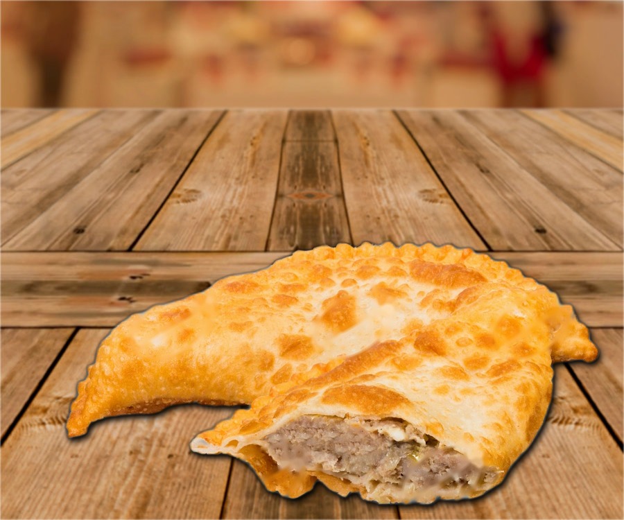 Pasties Chebureki filled with ground pork and beef, roasted, frozen